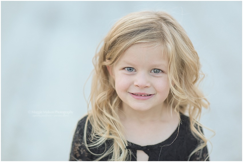 little girl in sunflowers